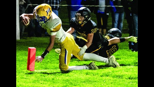 Photo for the Mascot by Brian Jeremiason. AJ Josephson scored a touchdown on a 12-yard run.