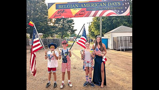 BELGIAN-AMERICAN DAYS
The winners of the best dressed Patriotic-themed .05k Fun Run during Belgian-American Days on Friday. Left to right; Harry Swedzinski, Colton DeRoode, and Maddie Myhre, along with Boxelder Bug Days Princess Addison Buysse. Contributed photo 