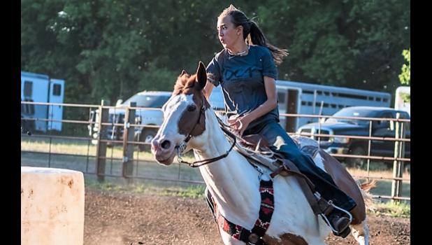 Photo for the Mascot by Brian Jeremiason. Lauren Badgett, riding Saintly Olena, won the Open Division I race.