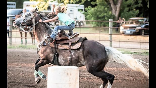 Photo for the Mascot by Brian Jeremiason. Hatty Fey, riding Whitchs Taboo, finished second in the Open I race, and was first in the Youth Division race.
