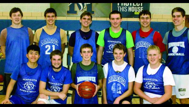 Staff Photo by Byron Higgin. The Minneota Boys Basketball Team includes: (front row, left to right) Amos Tu (not eligible), Grady Moorse, Alex Saltzer, Jared Josephson and Mitchell Rost. Back: Tristan Sorensen, Jacob Hennen, Nolan Boerboom, Logan Sussner, Isaac Hennen and Thomas Hennen. Missing: Sam Buysse.