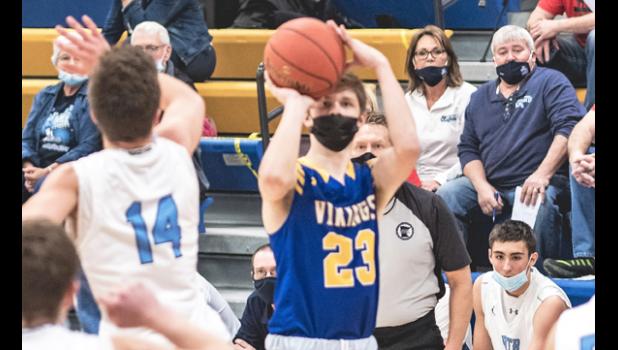 Mascot photo by Brian Jeremiason AJ Myhre launches a three-pointer against RTR on Friday in Minneota. Myhre made the shot.