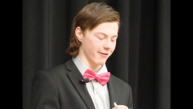 Photo for the Mascot by Sue Jacobson. Sophomore Brenden Kimpe explained and presented about the Extemporaneous Speaking category.