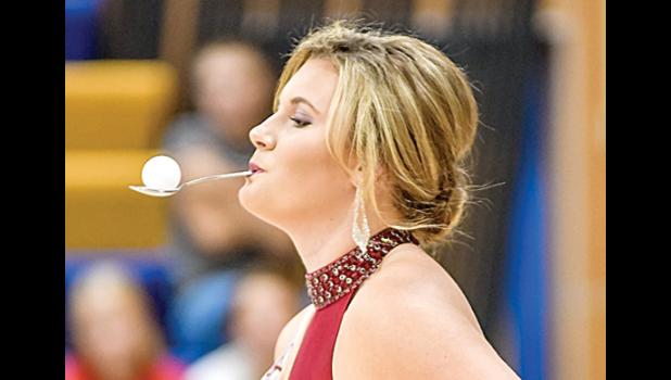 Photo for The Mascot by Brian Jeremiason. The candidates relay included Brooklyn Nelson balancing a golf ball.