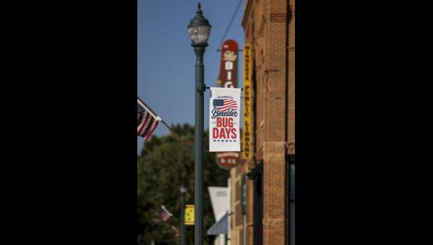 Several of these Boxelder Bug Days banners were recently placed on light poles along the business district. 