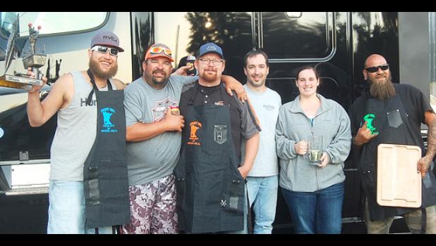 Staff photo by Scott Thoma. The winners of this year's Smokin' Ribs Cook-off, from left to right: Eric Faris, Nathan Freeman, Mike Nybo, Dallas Reese, Marissa Reese, John Otto.