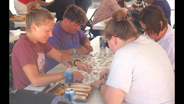 This group was among 12 teams in the puzzle competition. Clockwise from left: Gail Boe, Renee Wyffels, Alison Neet, and Alison’s daughter, Emma Neet. 