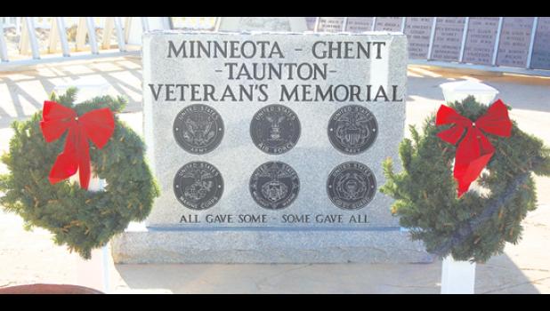 Staff photo by Scott Thoma. Wreaths were placed at Veterans Park by the American Legion recently.