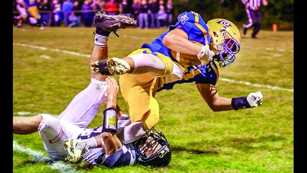 Photo for the Mascot by Brian Jeremiason Cole Sanow takes on an Ortonville defender.