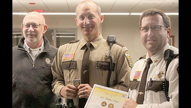 Staff Photo by Byron Higgin. Board Chairman Gary Crowley congratulated Conner, saying, “If we saved just one life, it was well worth it, but I think it saved more than that.”