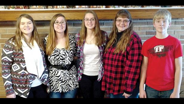 Special Photo. Chris and her children at Christmas 2017. They are: (Left to right) Lauryn, Larissa, Lacey, Chris and Devyn.