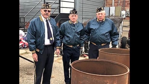 Contributed photo As part of the annual Veterans Day program that was held on Monday, Nov. 7 at the high school, local veterans hold a proper ceremony before burning of old and discarded American flags. Legion Commander Jim Fink, and Legion members Mike Sontag and Harold DeSmet performed the burning. Veterans Day is Friday, Nov. 11. Remember to thank a veteran for his/her service to their country.