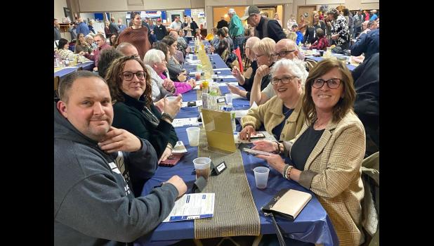 Contributed photo. The American Legion was packed with individuals attending Saturday evening’s Flurry of Fun, which capped Catholic Schools Week. The event included a meal, live and silent auction, and live entertainment.
