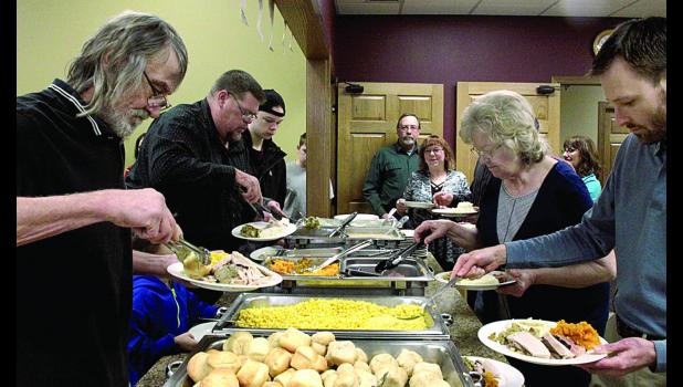 Staff Photo by Byron Higgin. Community Thanksgiving!