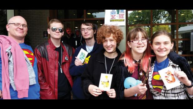 Staff Photo by Cherri Schmig. Left to right: Nathan Schmig, Duncan Schmig (dressed as The Star Lord from Guardians of the Galaxy), Ethan Long, Allison Johnson, Kara Schmig (dressed as a Gryffindor student), Laura Schmig (dressed as super girl’s disguise).