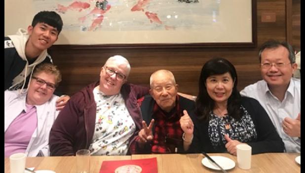 Special Photo. The group enjoyed a meal at a restaurant. They are: (left to right) Amos, Lori Head, Brenda Swoboda, Amos' grandfather, and Jennifer and Jimmy, his parents.