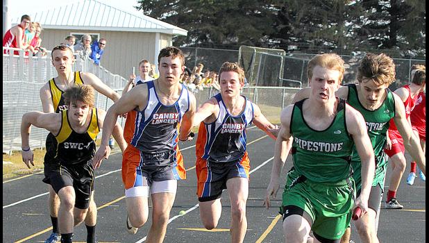 Photo for the Mascot by Kevin Kyle, Pipestone Star Jared Josephson handed off to Isaac Hennen in the 4x200-meter relay on Monday at Pipestone.