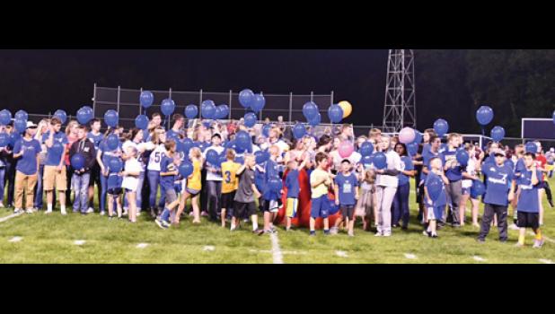 Special photo for the Mascot by Brian Jeremiason. Folks were lined up ready to launch the balloons for Donnie Schuelke's birthday.