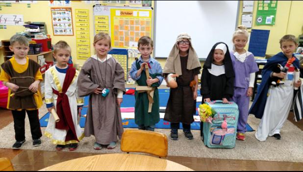 Special photo. Kindergarten students dressed up and learned about a Saint to celebrate All Saint’s Day. Noah Myhre is dressed as Saint Sebastian, William Jones as Saint Augustine, Kaitlyn Gorecki as Saint Anthony, Colton DeRoode as Saint Joseph, Charlie Myhre as Saint Joseph, Brisbyn Traen as Saint Gertrude, Stella Gorecki as Saint Maria and Audyn Traen as Saint Dominic.