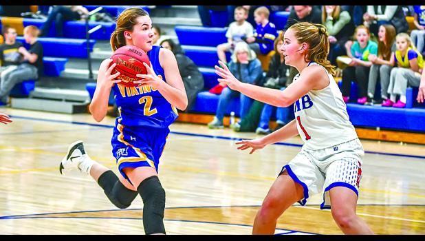 Morgan Kockelman raced to the basket against TMB's Cassidy Smith.