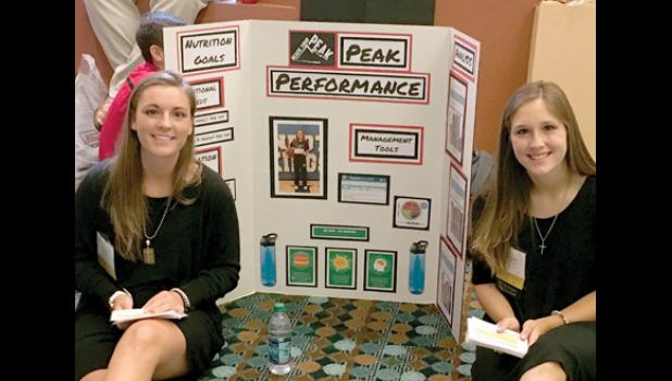 Special photo. Showing off their project was Addie & Katie Konold.