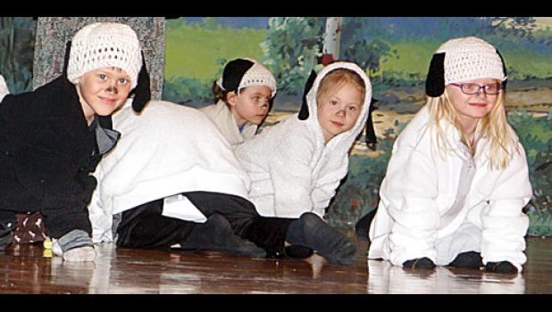 Photo for the Mascot by Sue Jacobson. Sheep trying to avoid the wolf were: (left to right) Audyn Traen, Emmalee Jones, Brisbyn Traen and Addyson Pohlen.