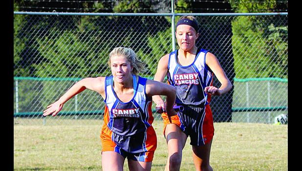 Photo for the Mascot by Kevin Kyle, Pipestone Star Canby-Minneota's 4x100-meter relay included Lizzy Gillingham and Kalli Jelen.