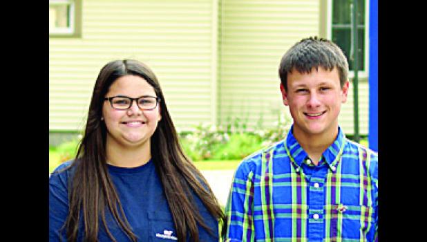 Photo for the Mascot by Sue Jacobson. Sophomore attendants Olivia Mahan-Deitte and Logan Schuelke.