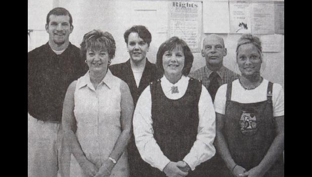 The new teachers at Minneota Public School for the 2001-2002 school year posed for this photo on the first day of school. Front row, left to right: Mary Noyes, Language Arts; LeaAnne Bot, Family & Consumer Science; Ann Schlenner, fifth grade. Back row, left to right: Derrek Sattler, Junior High Science; Tara Van Heel, Language Arts; Ron Mann, Industrial Technology. 