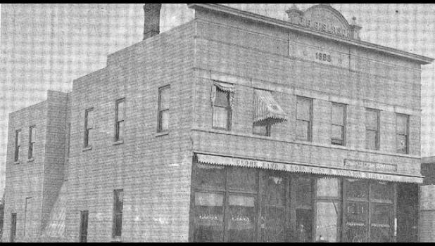 Contributed photo This photo taken in 1904 shows the Globe Land and Loan Company and the W.B. Gislason Hardware Store in downtown Minneota. The building was constructed in 1898 by J.B. Gislason.
