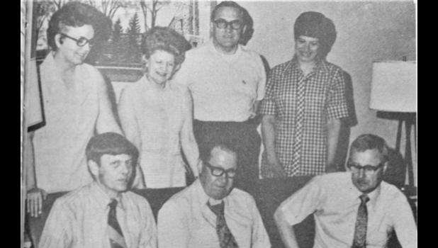 Special photo. These members of Hope Lutheran Church of Minneota gathered at the church on June 18, 1972 to make final preparations for the 100th anniversary of their congregation. The congregation was formed in December of 1872 and members are planning an anniversary observance from June 21-23. Front row, left to right: Rev. John R. Thorstensen, Lester R. Christianson, Gerald Olson. Back row, left to right: Mrs. Lester Christianson, Mrs. Carl Strand. Ralph Larson and Mrs. Allan Josephson.