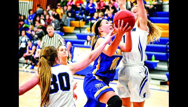 Photo by Brian Jeremiason. Morgan Hennen drives the lane against Lakeview.