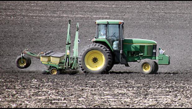 Staff Photo by Byron Higgin. Like so many others, Bernie Moorse took to the fields last week with one thought in mind ... to give it one final shot to get a crop in this year. Spring has turned to summer and it’s way past prime time for planting.