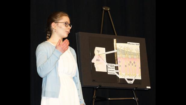 Photo for the Mascot by Sue Jacobson. Rachel Engels gave her Informative speech.