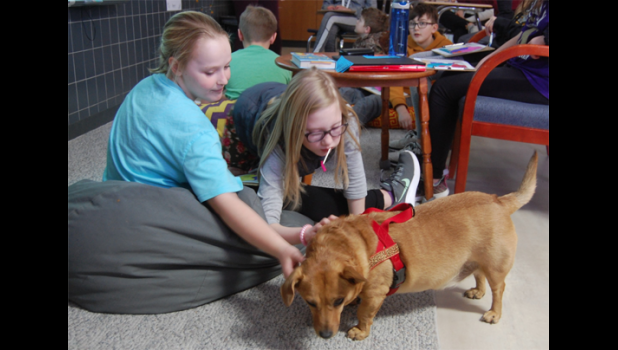 Special photo. Roger is a hit with the students.