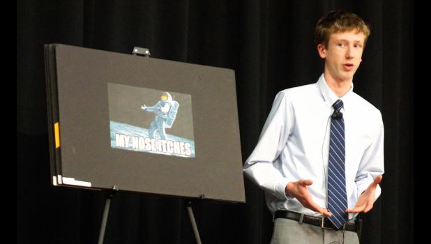 Photo for the Mascot by Sue Jacobson. Sean Dilley was trying to inform the audience during his Informative Speech.