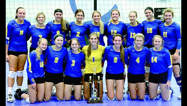 Staff Photo by Byron Higgin The team after the championship included: (Front row, left to right) McKenzie Tolk, Abby Rost, Ellie Pesch, abby Hennen, Morgan Kockelman, Lizzy Gillingham and Madison Sorenson. Back: Lydia Sussner, Ali DeVlaeminck, Natalee Rolbiecki, Rachel Vlaminck, Morgan Hennen, Sydney Larson, McKenna Yost, Abby Frie and Brooklyn Nelson.