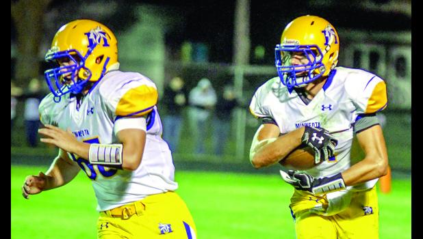 Photo for the Mascot by Brian Jeremiason Thomas Hennen follows the block of Josh Laleman. Hennen may have to assume more quarterback duties after his brother Jacob broke his wrist at Sleepy Eye.