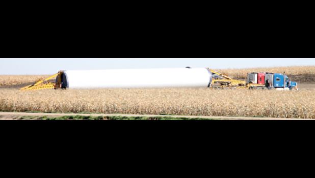 Staff photo by Byron Higgin. A turbine is seen amongst a field of corn as it seemed to be growing faster than the crop.