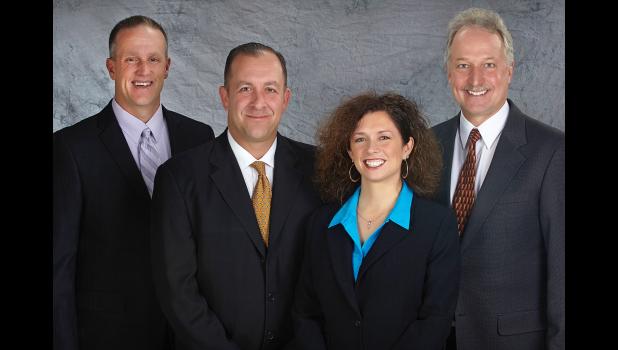 Special photo. Ameriprise Financial Advisors Gabe Piper, Corey Skogrand, Cory Ann Skogrand and Larry Schiavo.