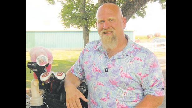 Mascot photo by Scott Thoma Dale Verschelde, who won the Fourth Flight at the 55th annual Wynston Boe Golf Tournament at Countryside Golf Club on Sunday, was decked out in a flamingo shirt and the head covers in his golf bag were flamingos, as well.
