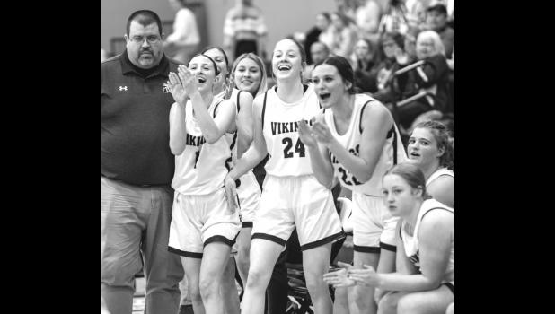 Mascot photo by Brian Jeremiason Minneota’s bench erupts during a good play in the Vikings’ victory over Russell-Tyler-Ruthton on Monday night in Tyler. The Vikings, 75-50.