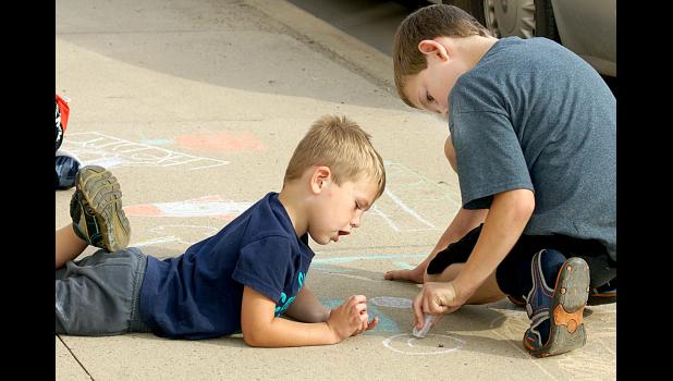 Photo for the Mascot by Sue Jacobson William Buysse studied the chalk art of August Buysse.