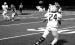Minneota quarterback Tristen Sussner (5) completes a pass to Kaden Christensen against MACCRAY lst Friday night. 