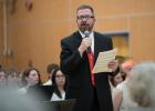 Band director John Voit introduces a song before the band played.