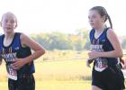 Hannah Fadness, left, and Lillie Wollum of Canby/Minneota compete last Thursday in a cross country meet held in Canby. 