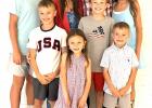 The Ashley and Jordan Dahl family. Front, left to right: Monroe, 5. and Hayes, 7. Middle row, left to right: Truman, 9; and Cleveland, 11. Back row, Lincoln, 15; Ashley, Jordan, and McKinley, 13. 