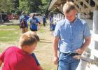Several kids wanted to pet the Cole Myhre's sheep, which won a Grand Champion ribbon.