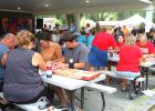 Puzzle contests, like this one at the Porter Harvest Festival last summer, have become increasingly popular in area community festivals. 