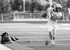 Easton Johnston breaks a tackle and runs 91 yards for a touchdown on the opening kickoff Friday against Lakeview in Cottonwood.